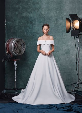 "Angelina" by Sareh Nouri sareh-nouri-fall-2019-bridal-collection-wedding-dress-angelina-faille-off-the-shoulder-ball-gown