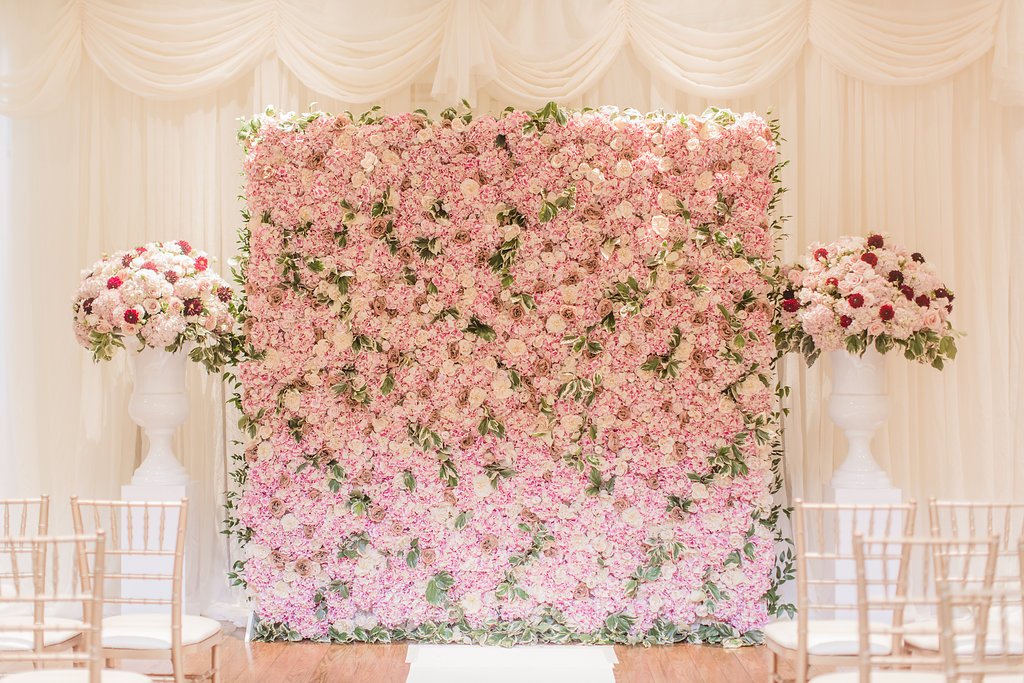 pink-flower-wall-at-ceremony