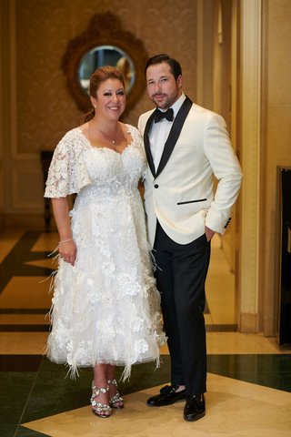 bride and groom reception outfits