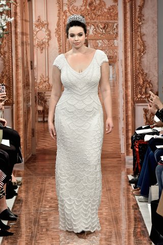 "Serena" by THEIA serena-by-theia-spring-2019-ivory-cap-sleeve-gown-with-scallops-of-teardrop-pearls-and-sequins