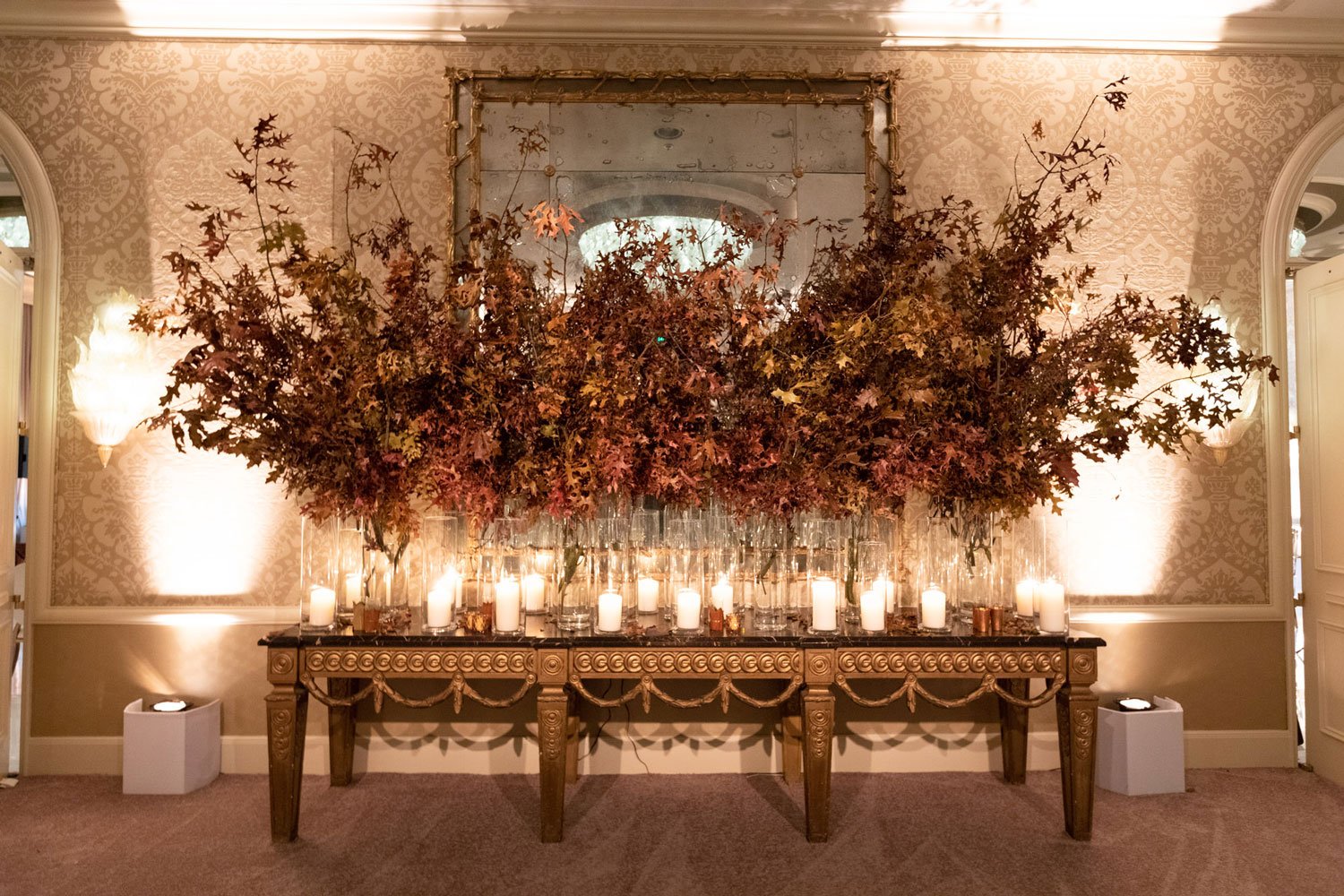 fall wedding ideas fall foliage leaves on escort card table with candles