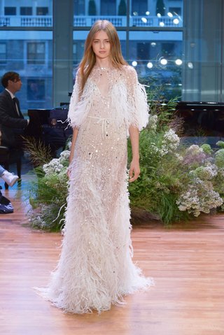 "Stardust" by Monique Lhuillier monique-lhuillier-fall-2017-bridal-collection-stardust-wedding-dress-sheath-feather-skirt-beading