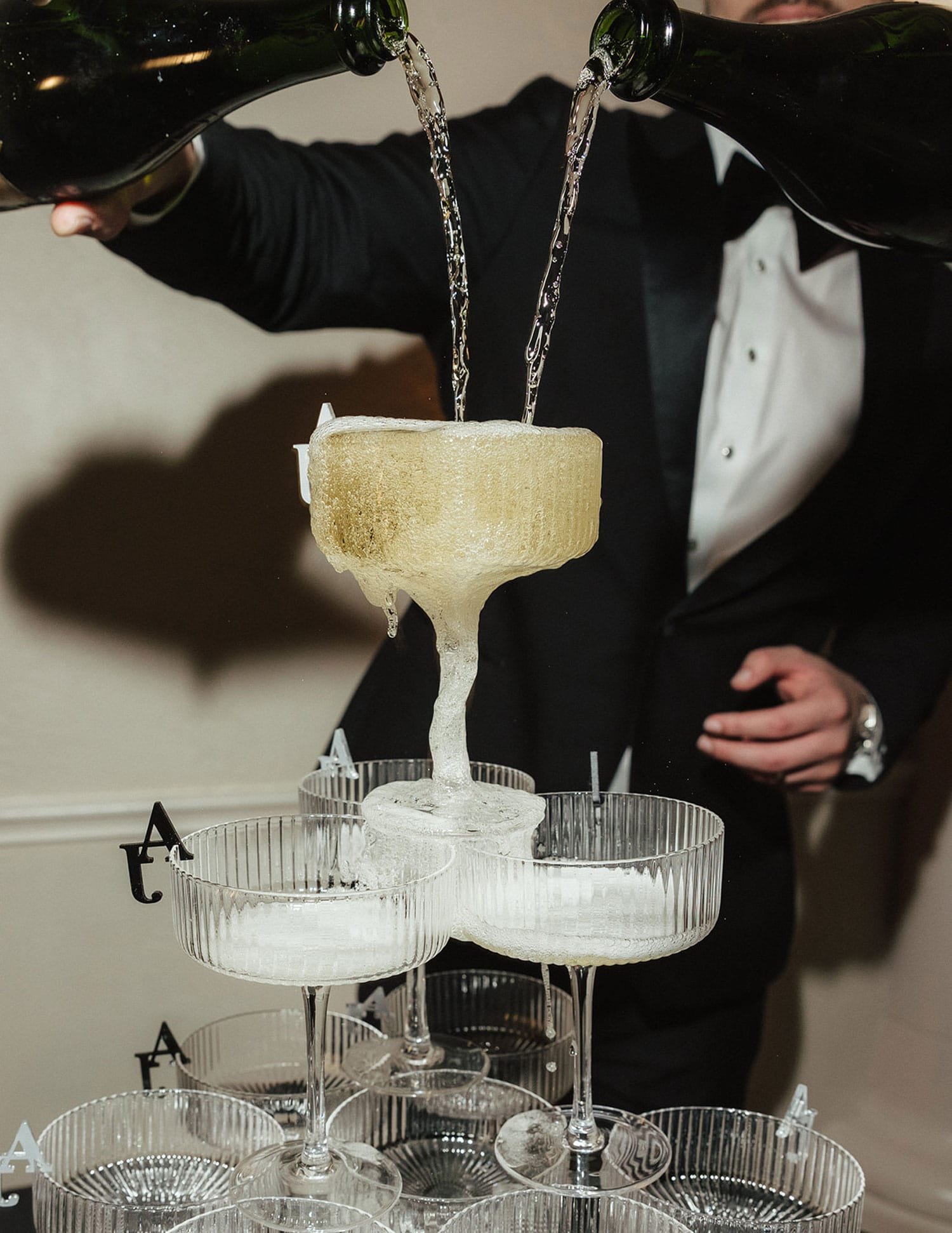 ribbed coupe glass champagne tower for new year's eve wedding
