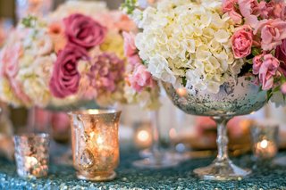 Mercury-Glass Vase on Sequin Table silver-mercury-glass-vessel-with-white-and-pink-flowers