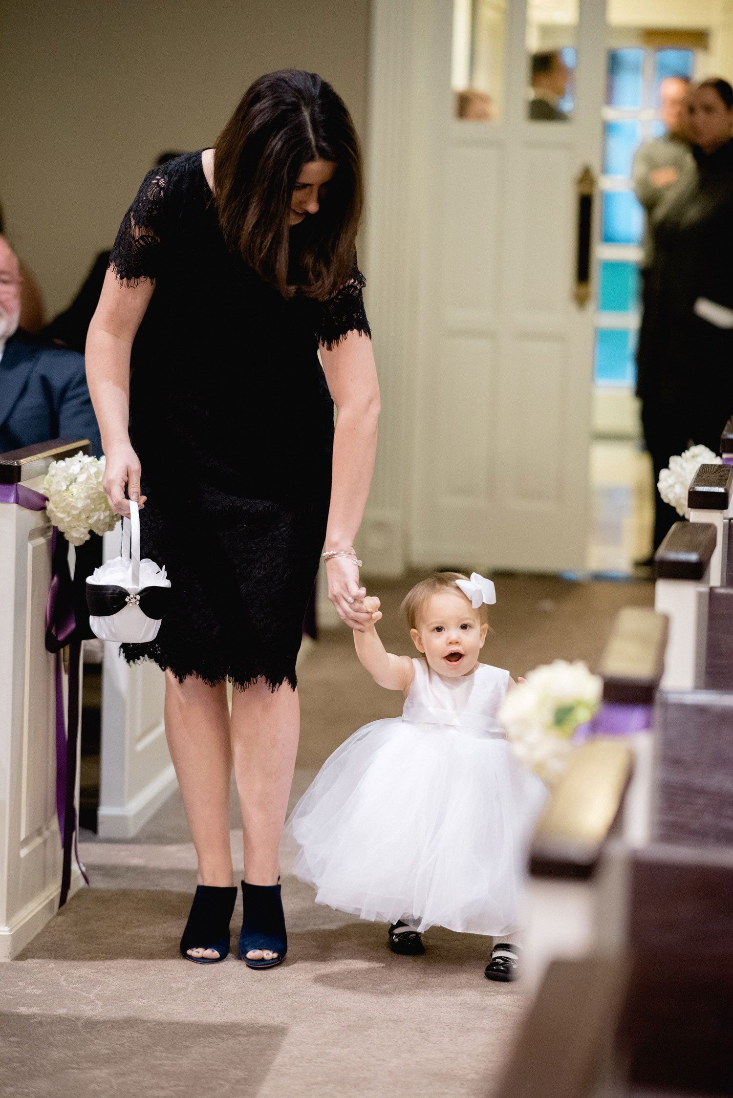 Flower Girl Walking Down Aisle with Help