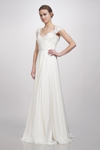 "Stella" Gown by THEIA a-dress-with-capped-sleeves-a-slight-v-neckline-floral-detailing-on-the-bodice-a-thin-belt-and-a