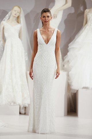 "Galica" tony-ward-galica-sheath-gown-with-a-deep-v-neckline-and-beading