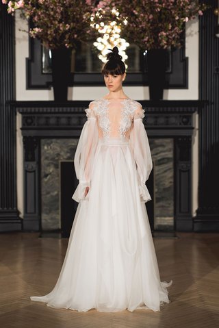 "Aria" by Ines Di Santo ines-di-santo-spring-2019-bridal-collection-wedding-dress-aria-off-shoulder-poet-sleeve-a-line-godet