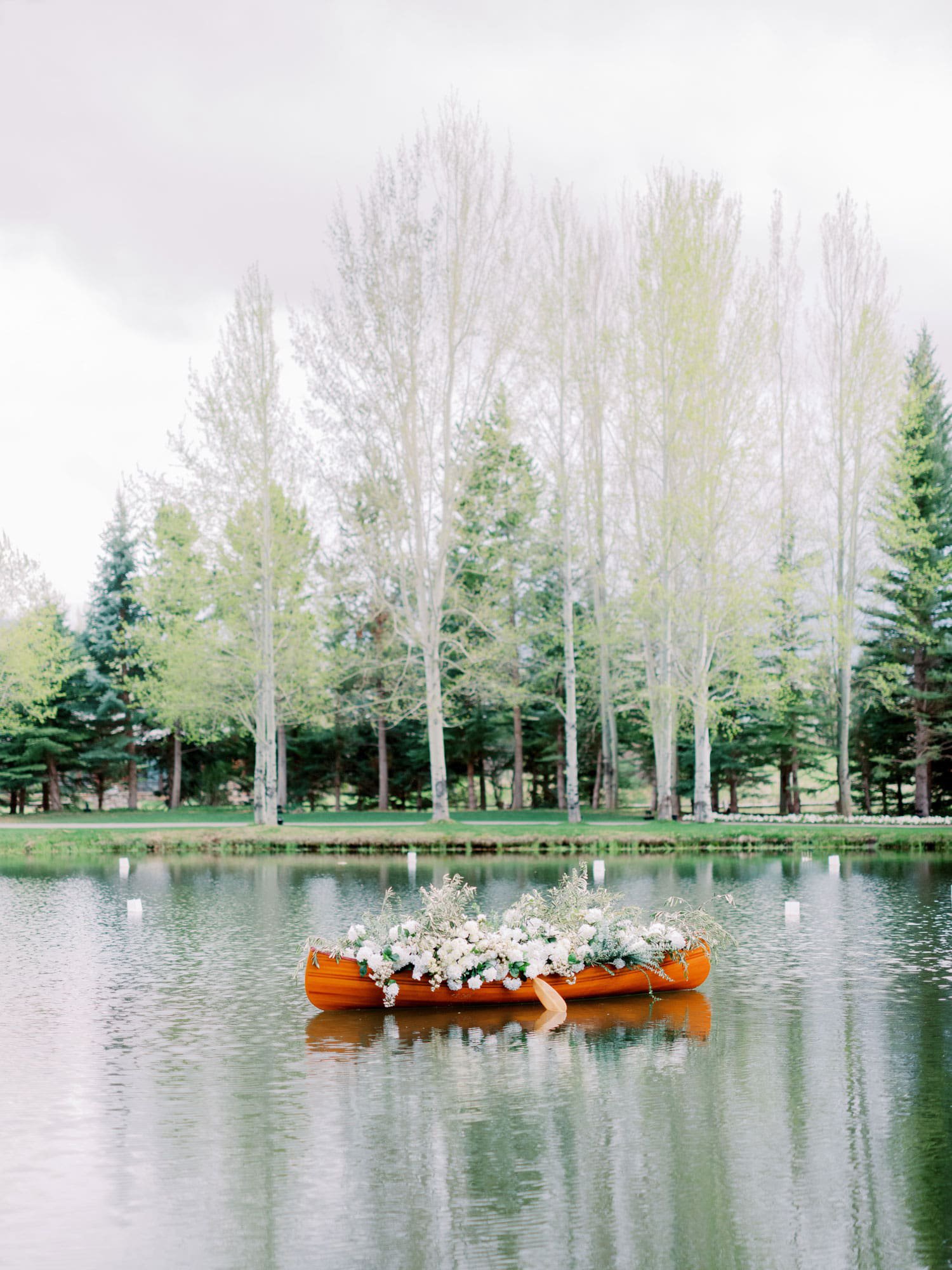Canoe Filled with Flowers at Wedding