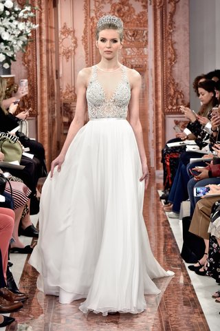 "Helena" by THEIA helena-by-theia-spring-2019-pearl-and-crystal-illusion-halter-bodice-with-silk-satin-ball-skirt