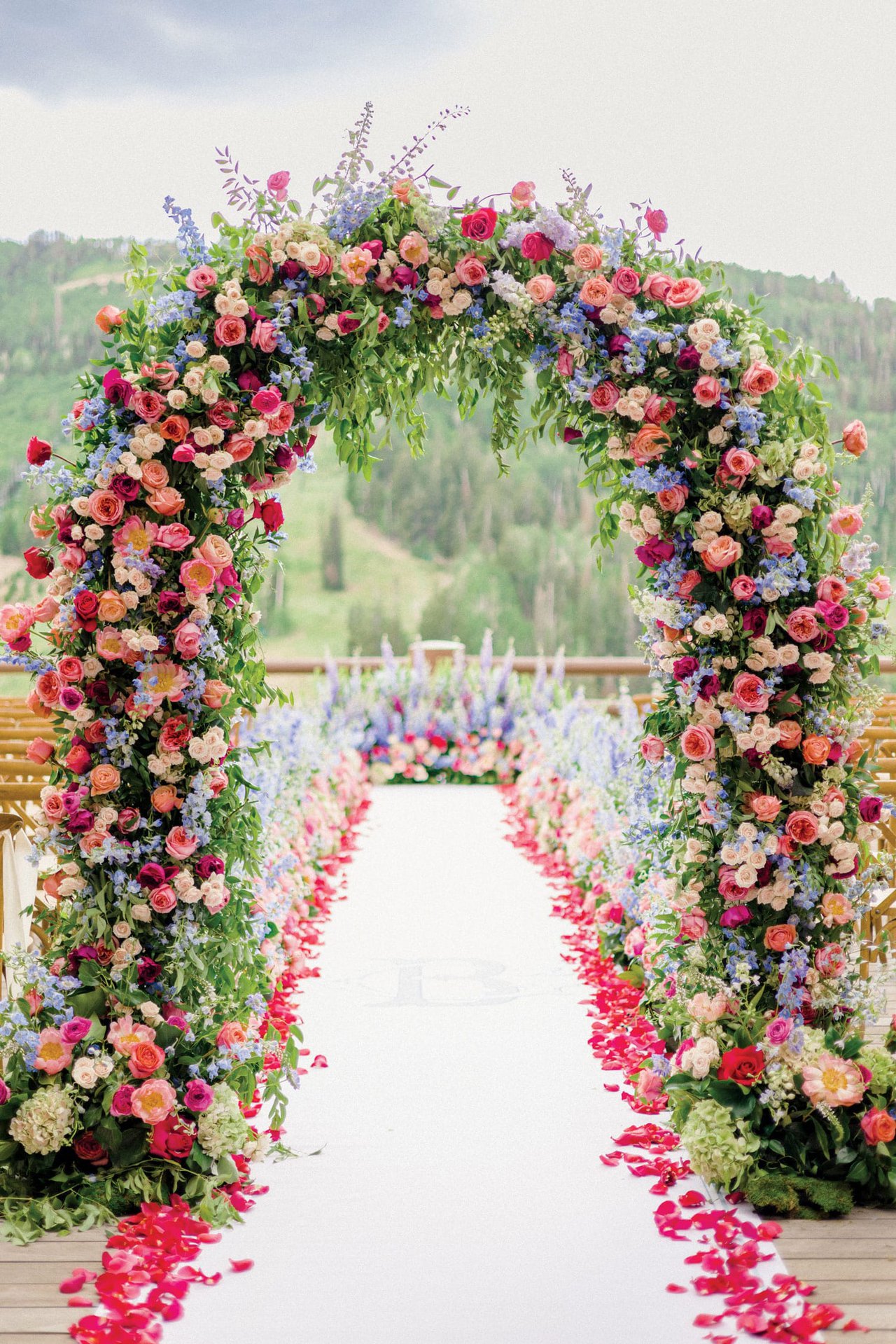 Colorful Floral Arch Over Aisle Runner
