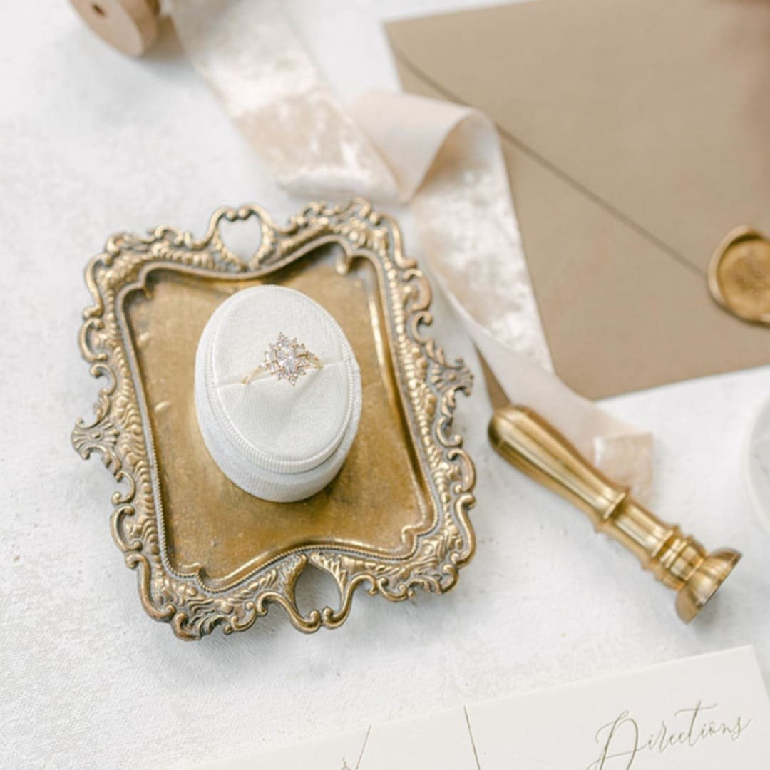 Velvet heirloom ring box with engagement ring