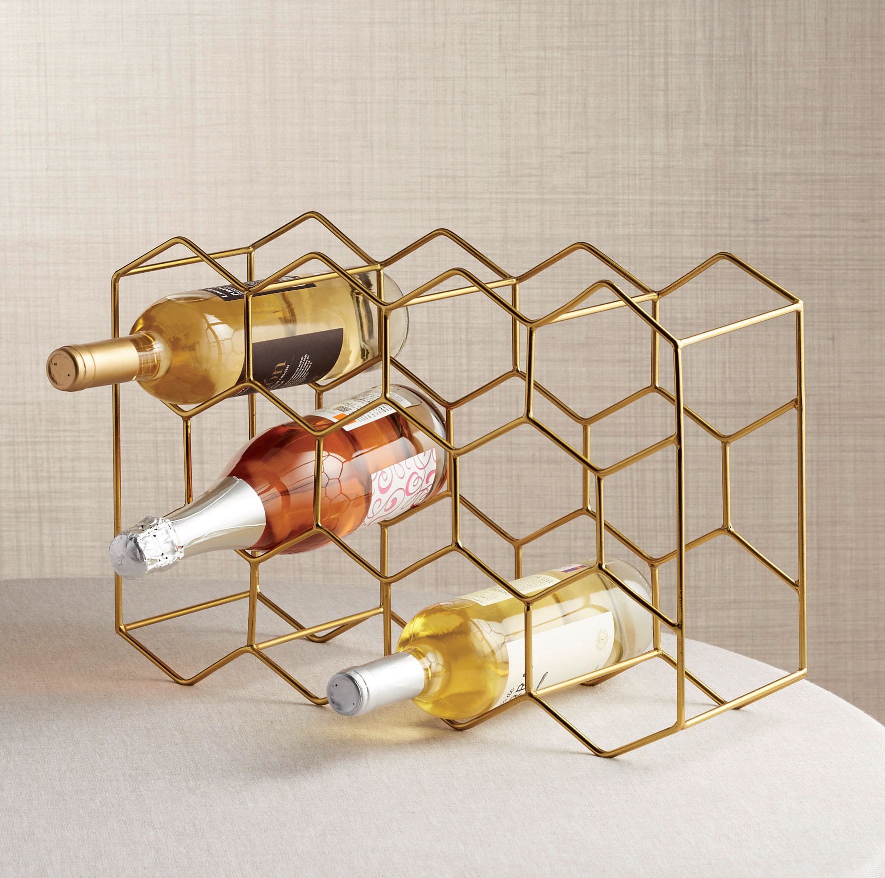 Crate and Barrel 11-bottle gold wine rack wedding registry ideas