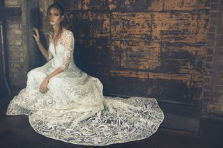 "Evita" by Sareh Nouri sareh-nouri-fall-2018-wedding-dress-evita-long-three-quarter-sleeve-lace-gown-cathedral-train