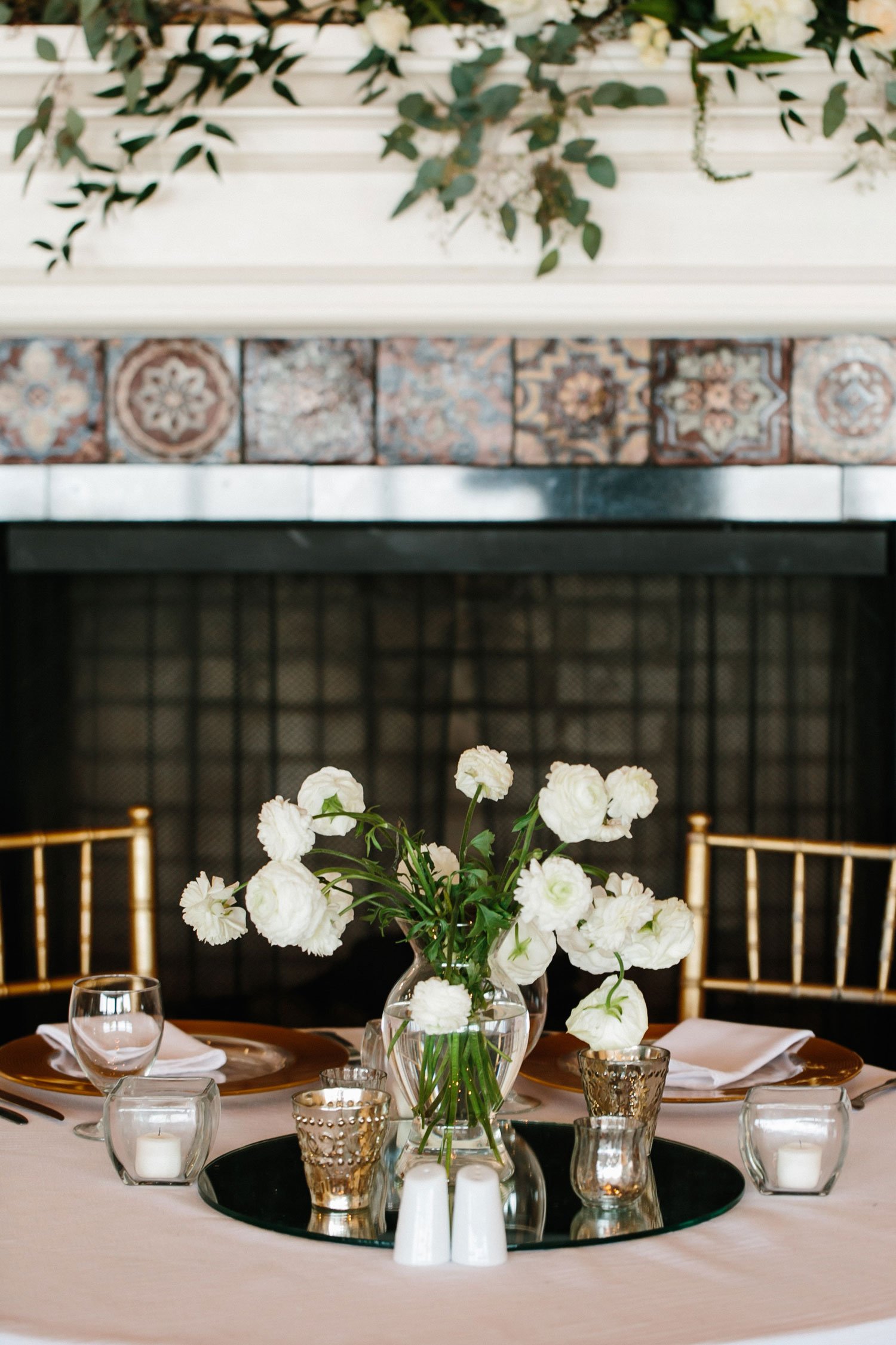 White Flowers in Clear Vase on Mirror