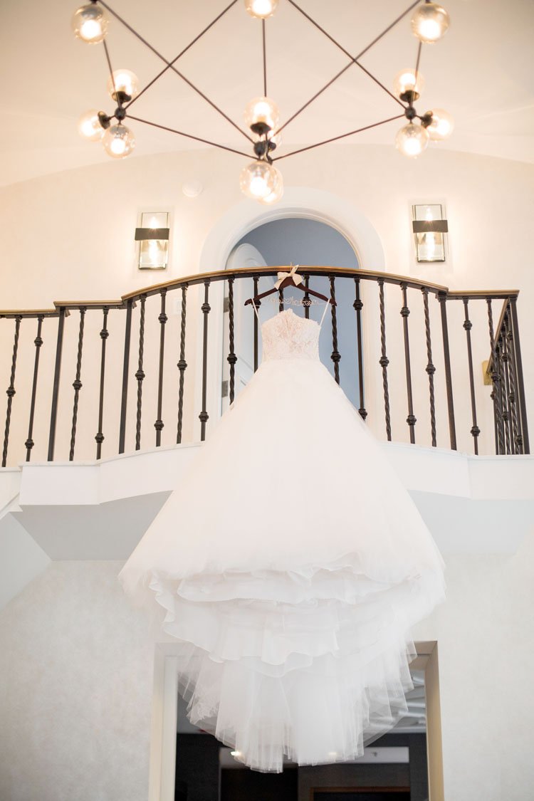 Ball Gown Hanging from Balcony