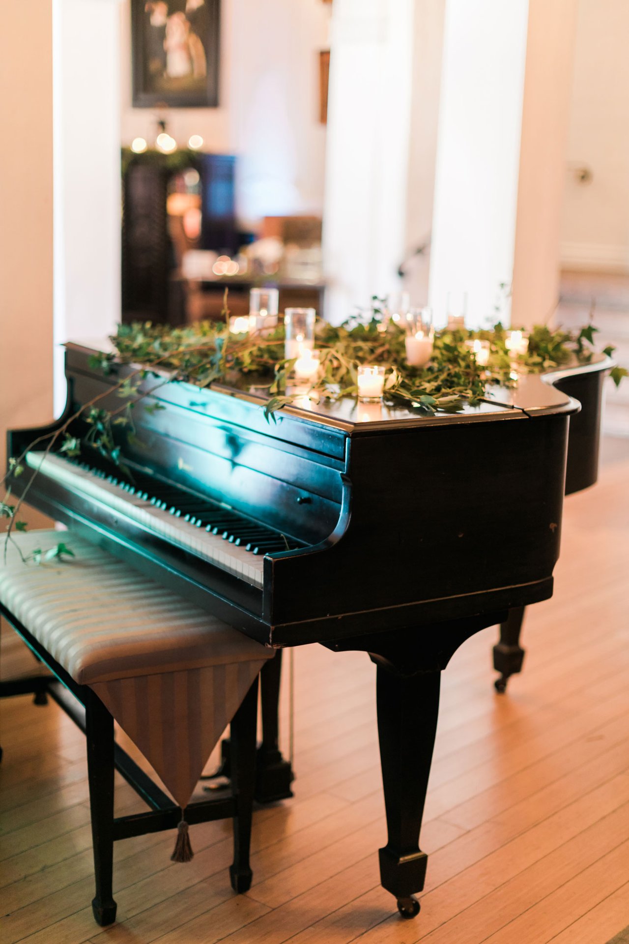 Piano Decorated with Candles & Greenery