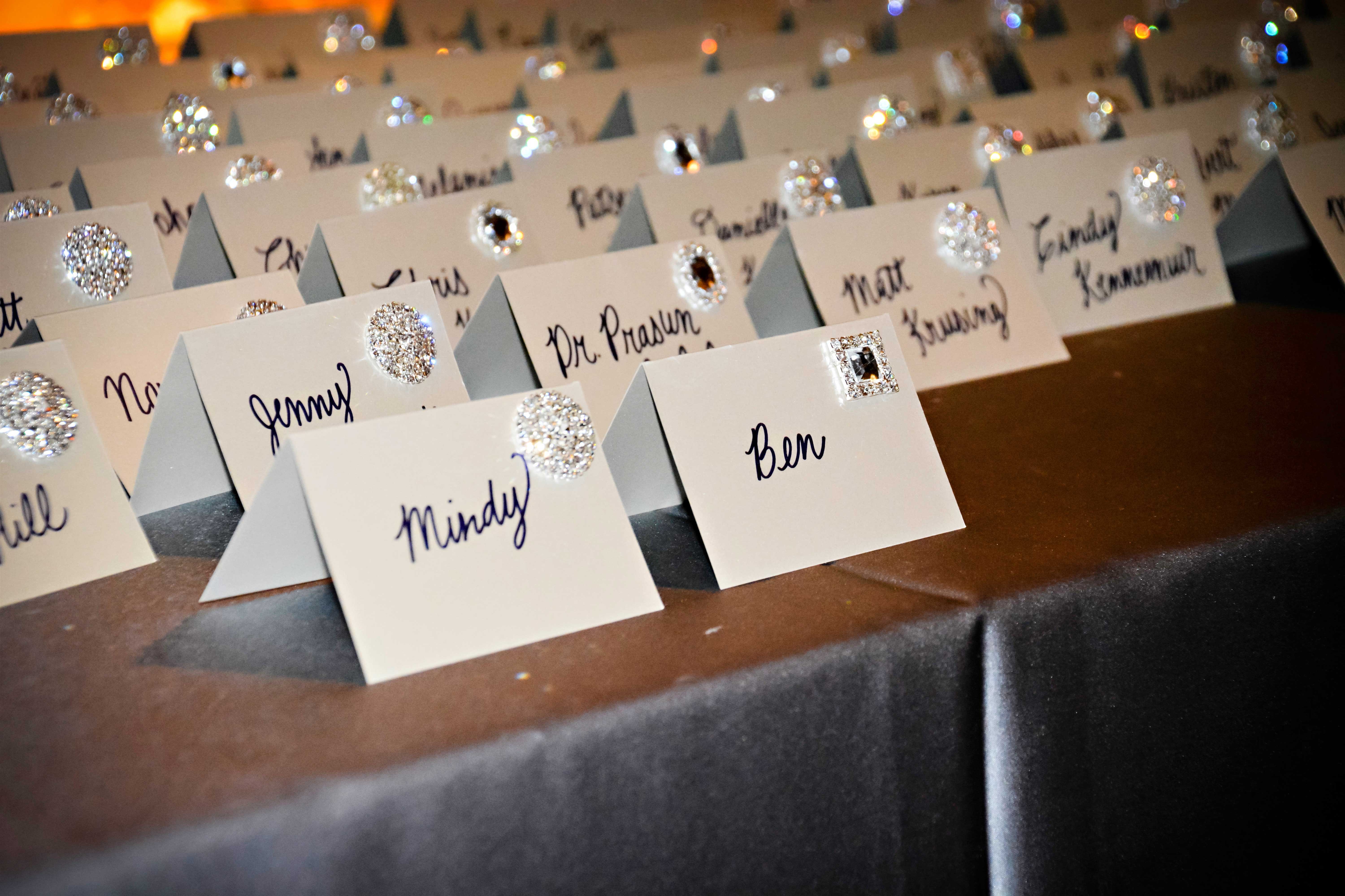 Handwritten Escort Cards with Silver Details
