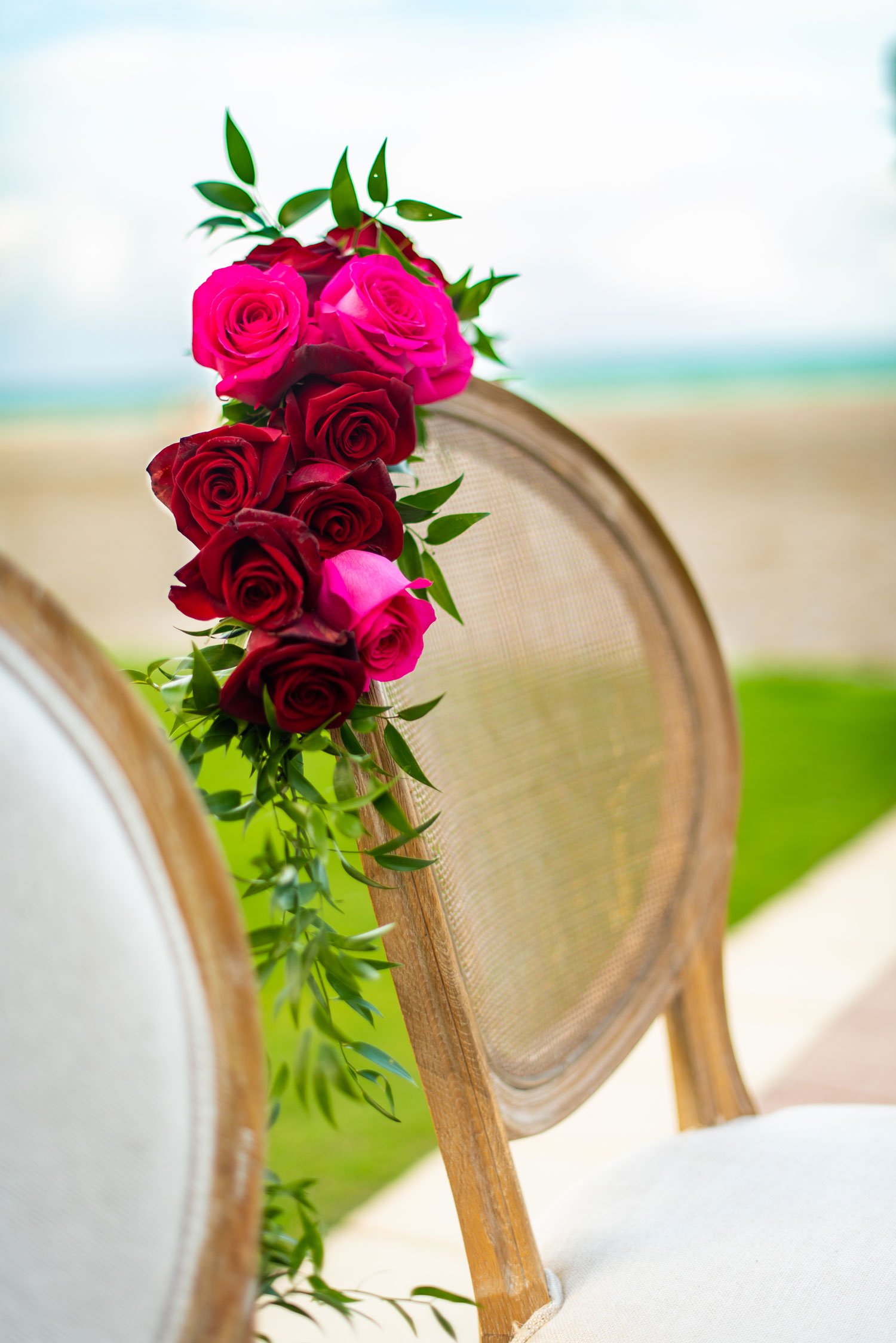 Pink & Red Roses on Ceremony Chair