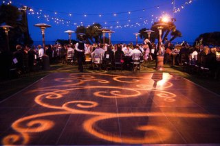 Oceanfront Reception Space illuminated-dance-floor-and-twinkling-lights-over-tables