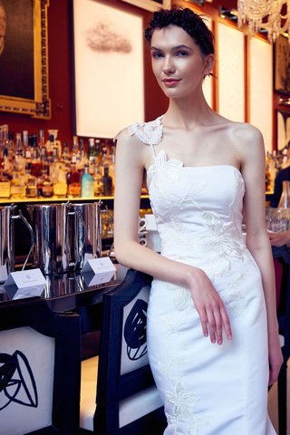 "Leila" by Isabelle Armstrong isabelle-armstrong-fall-2018-wedding-dress-leila-one-shoulder-trumpet-gown-flower-applique-strap