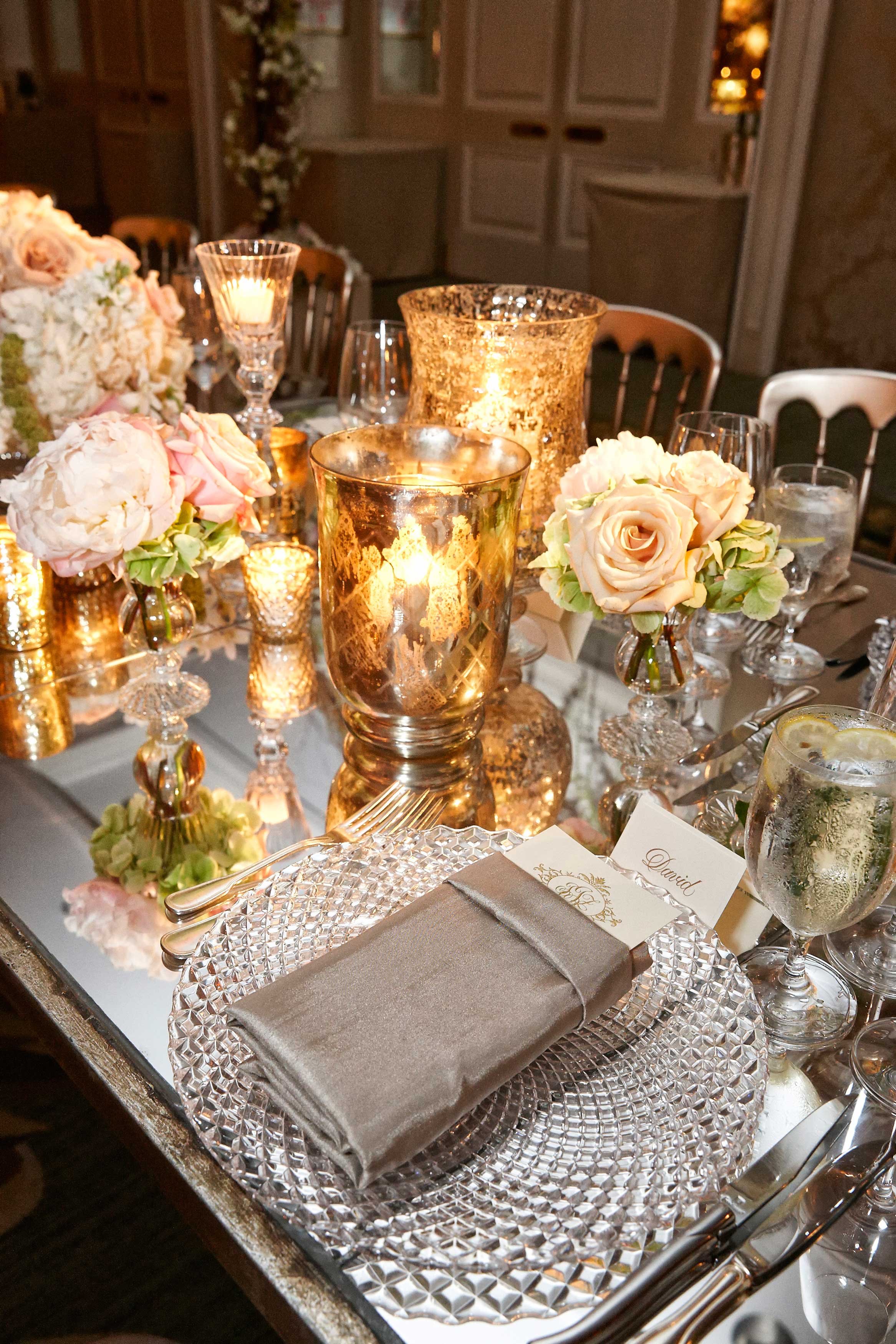 Mirror Table with Golden Candle Vessels