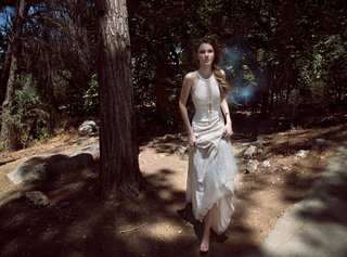 Halter Gown with Criss-Cross Neckline, Embellishments by GALA by Galia Lahav a-sheath-gown-with-halter-straps-a-slit-neckline-with-a-criss-cross-pattern-and-heavy-embellishmen