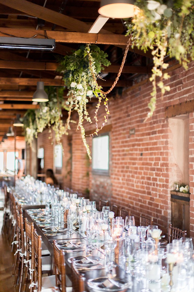 Long Reception Table by Brick Wall
