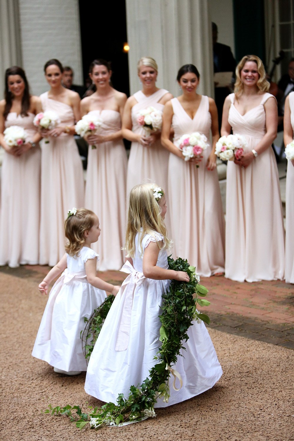 Flower Girls Carrying Garland
