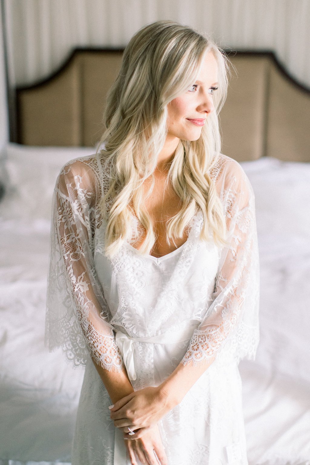 Bride in Elegant White Lace Robe