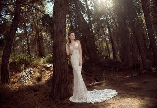 A Fitted, Embellished Gown by GALA by Galia Lahav a-fitted-gown-with-a-long-skirt-plunging-v-neckline-thing-straps-and-heavy-embellishments-through