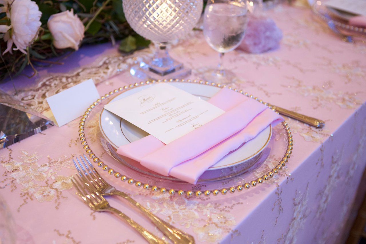 Pink Linens with Gold Flatware & Chargers