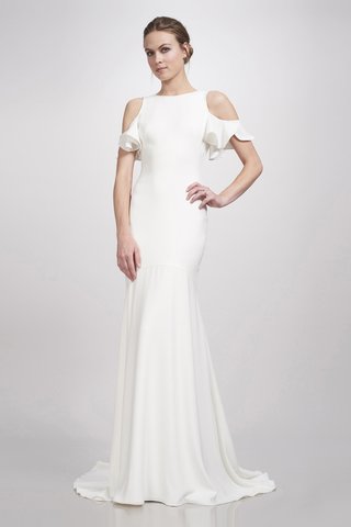 "Kelly" Gown by THEIA a-gown-with-a-high-neckline-shoulder-cut-outs-frills-on-the-sleeves-and-a-slightly-pleated-skirt