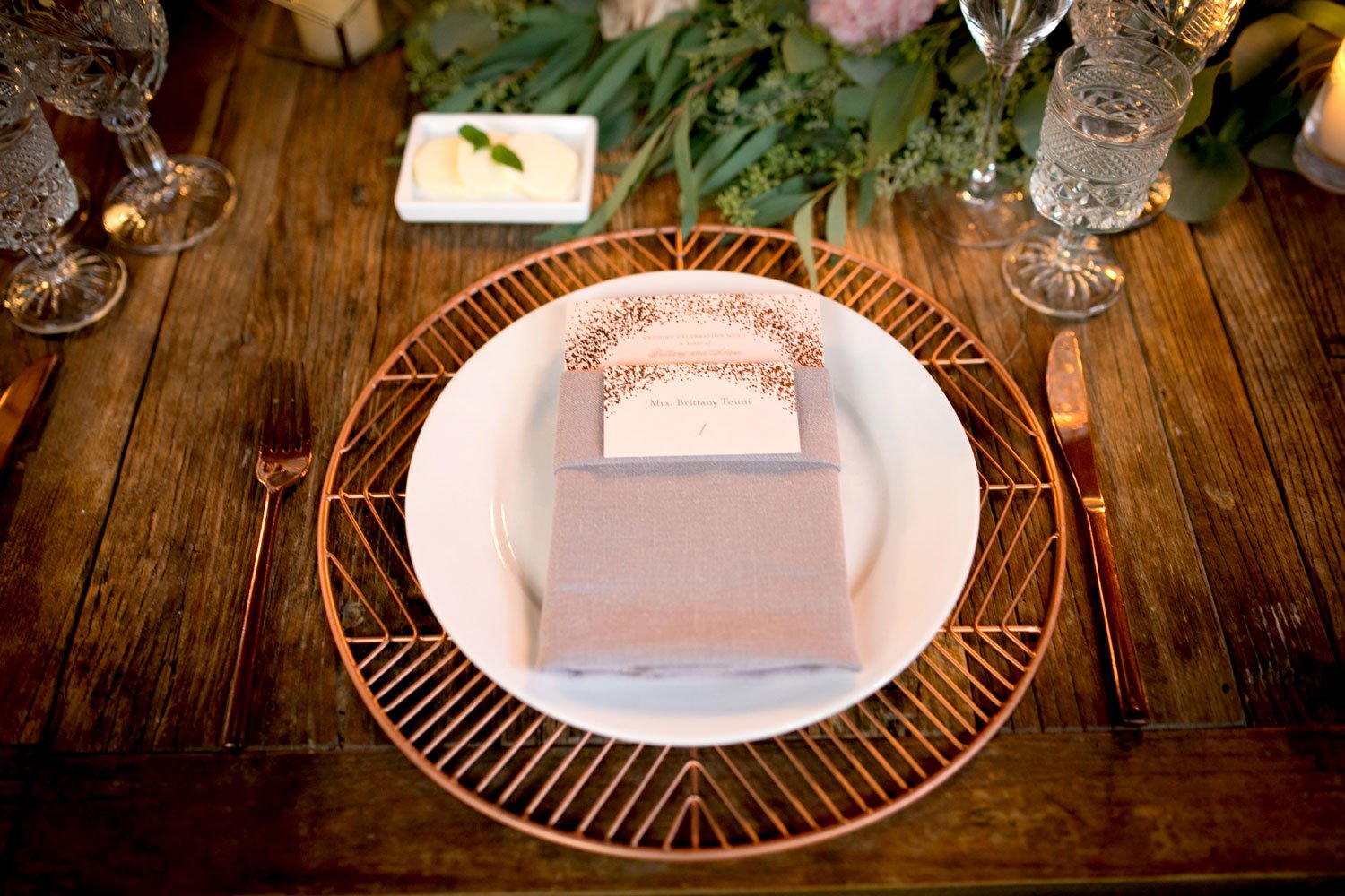 Copper Charger Plate on Wood Table