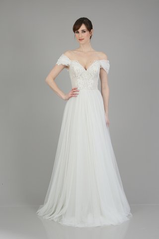 "Harper" Gown by THEIA an-off-the-shoulder-dress-with-a-v-neckline-intricate-detailing-on-the-bodice-and-a-tulle-skirt-by