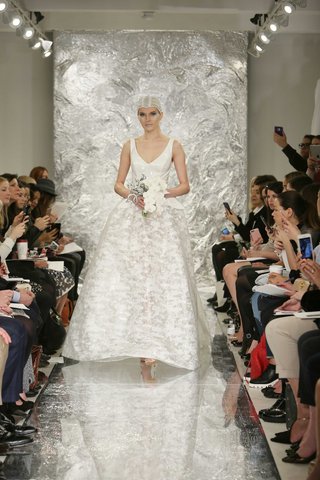 "Amidala" by THEIA theia-spring-2017-amidala-ball-gown-v-neck-sleeveless-wedding-dress-with-vinyl-bodice-peplum