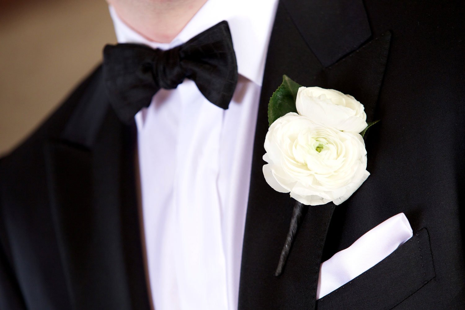 Ranunculus Boutonniere on Tux Lapel