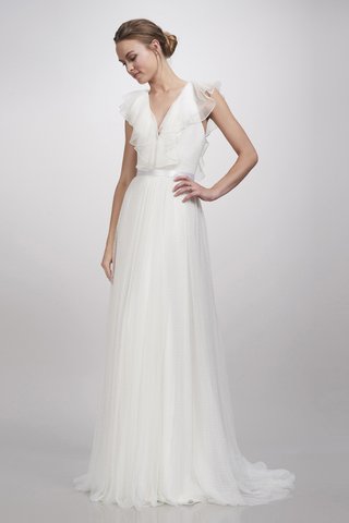 "Aurora" Gown by THEIA gown-with-deep-v-neckline-frill-detailing-on-the-sleeves-a-thin-belt-and-a-tulle-skirt-by-theia