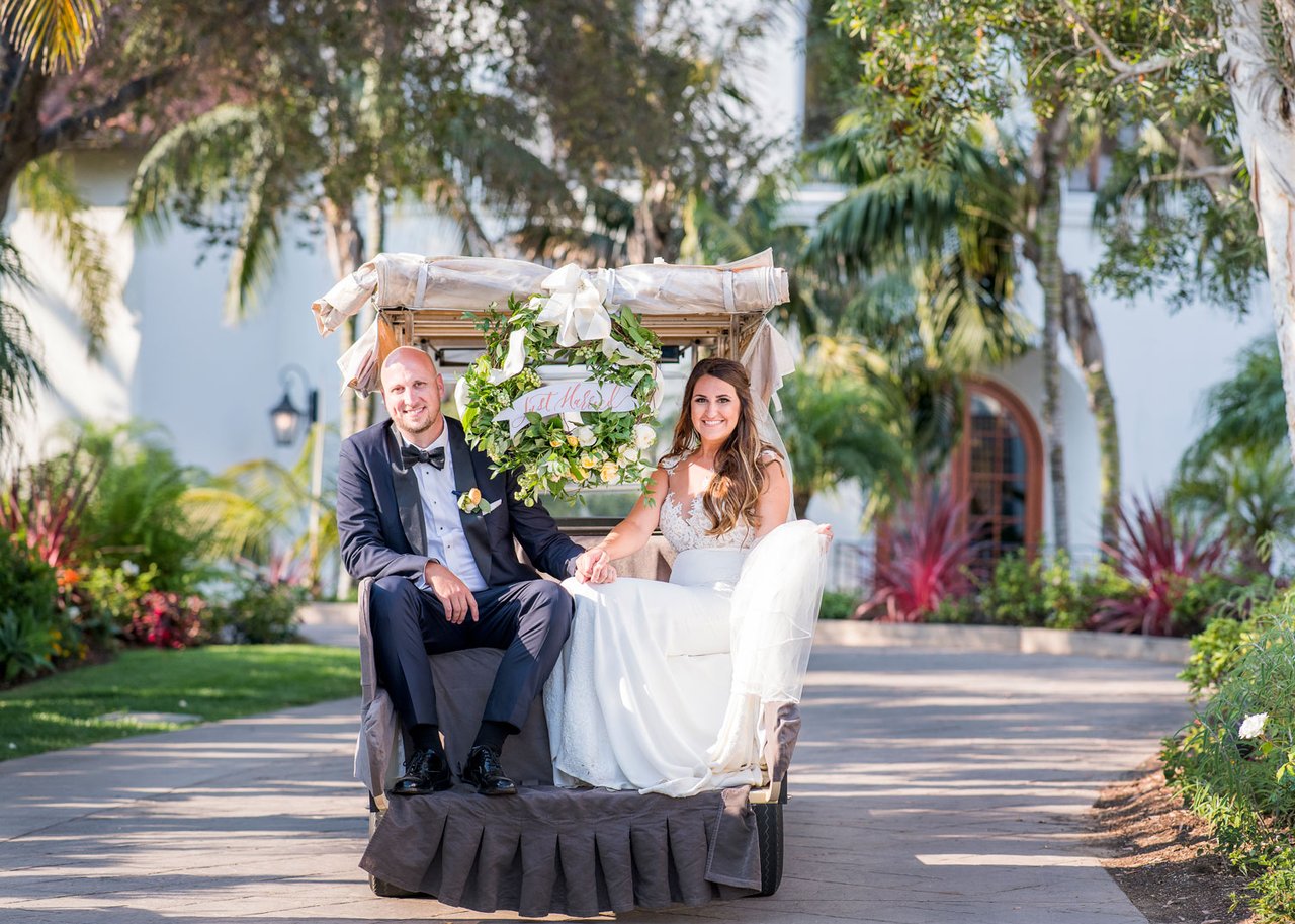 Bride & Groom on Decorated Golf Cart