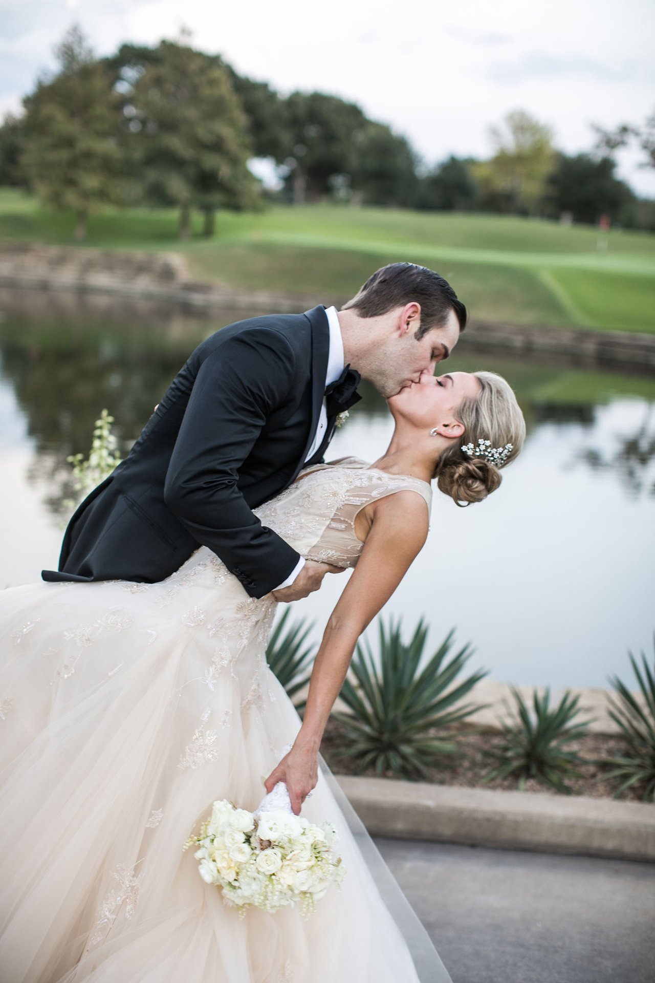 Groom Kisses Bride After Dip